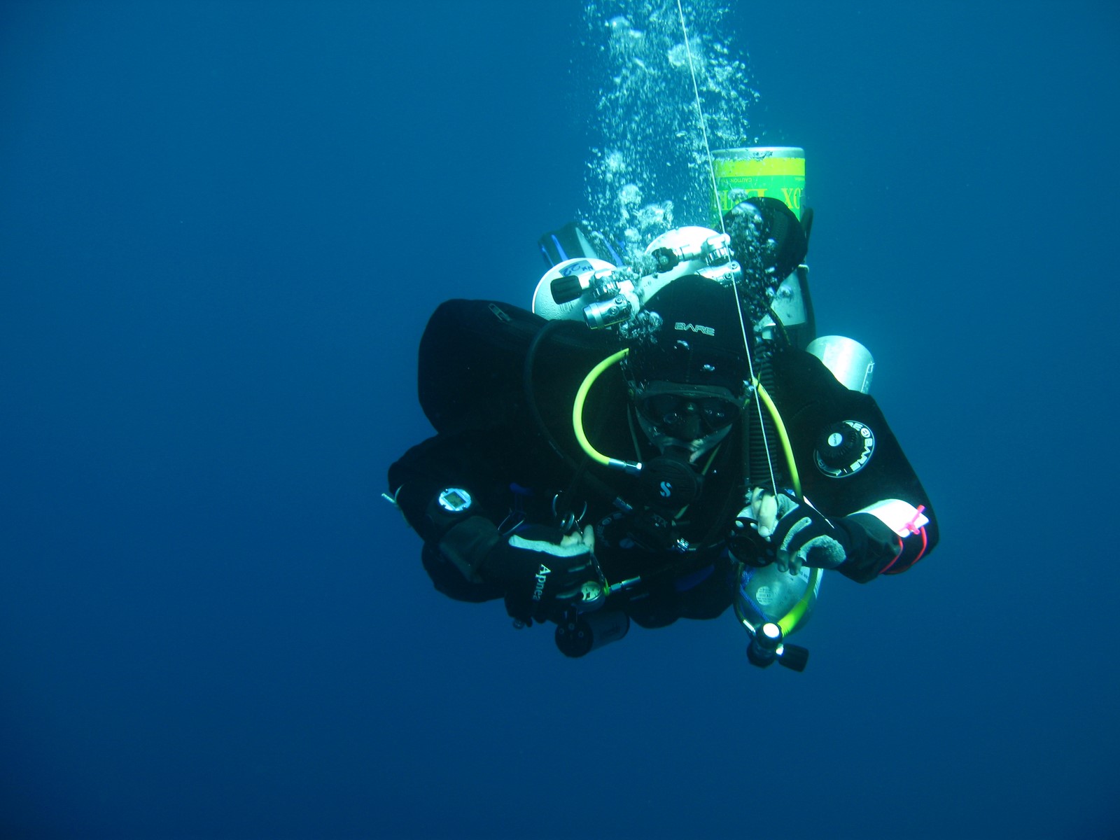 Commercial diver conducting an underwater inspection in Naxos